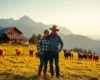 Bauernpaar auf einer Almwiese in Tirol — Bäuerin sucht Mann Österreich FarmerSingles